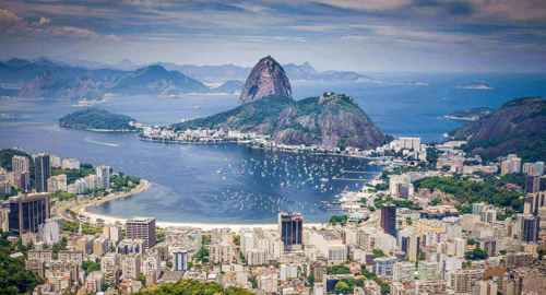 South America - Brazil, aerial view of Rio de Janeiro with Sugarloaf Mountain and the city's coastline. 